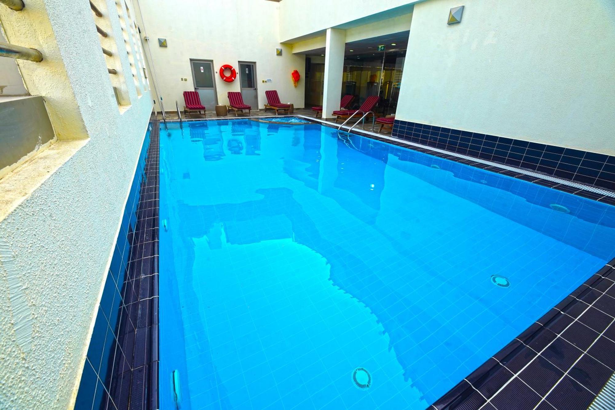 Grand Villaggio Hotel Abou Dabi Extérieur photo